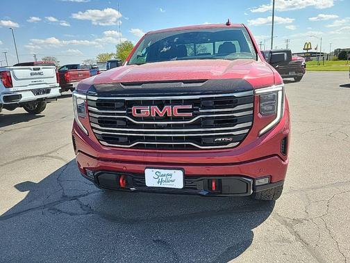Volcanic Red Tintcoat 2026 GMC Sierra 1500 AT4