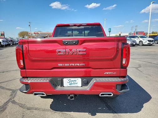 Volcanic Red Tintcoat 2026 GMC Sierra 1500 AT4