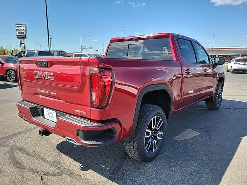 Volcanic Red Tintcoat 2026 GMC Sierra 1500 AT4