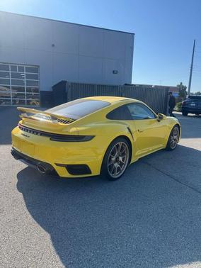 Racing Yellow 2023 Porsche 911 Turbo S
