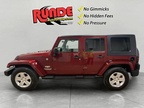 Red 2009 Jeep Wrangler Unlimited Sahara