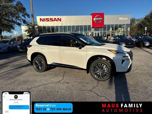 Everest White Pearl/Super Black 2026 Nissan Rogue Platinum