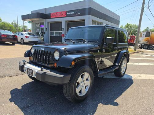 BLK 2012 Jeep Wrangler Sahara