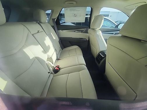 Radiant Red Tintcoat 2026 Cadillac XT5 Premium Luxury