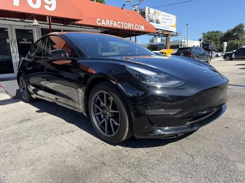 Solid Black 2021 Tesla Model 3 Standard Range Plus