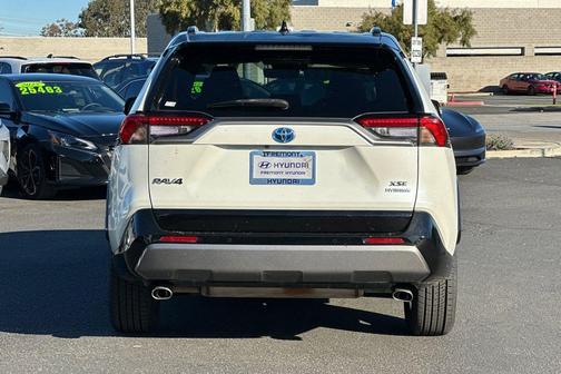 Blizzard Pearl/Midnight Black Metallic 2021 Toyota RAV4 Hybrid SE