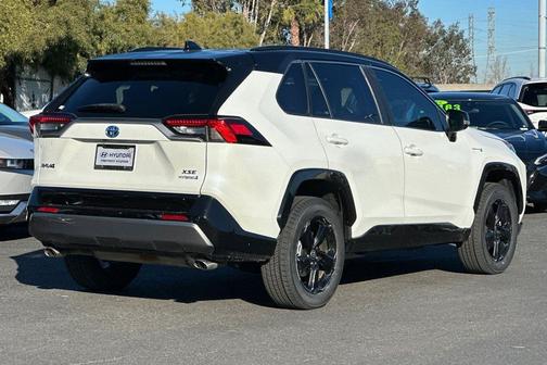Blizzard Pearl/Midnight Black Metallic 2021 Toyota RAV4 Hybrid SE