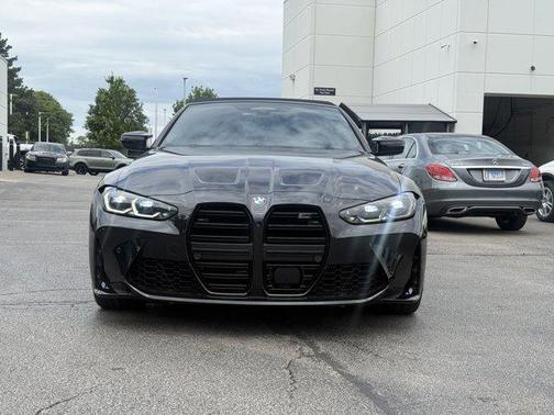 Black Sapphire Metallic 2024 BMW M4 Competition xDrive