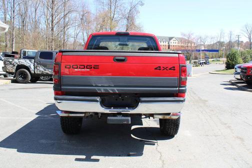 Red 2000 Dodge Ram 1500 Short Bed