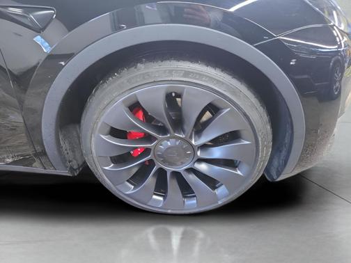 Solid Black 2024 Tesla Model Y Performance Dual Motor All-Wheel Drive