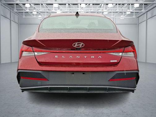 Ultimate Red Metallic 2024 Hyundai ELANTRA HEV Blue