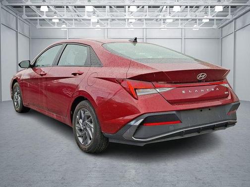 Ultimate Red Metallic 2024 Hyundai ELANTRA HEV Blue