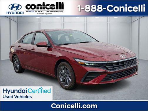 Ultimate Red Metallic 2024 Hyundai ELANTRA HEV Blue