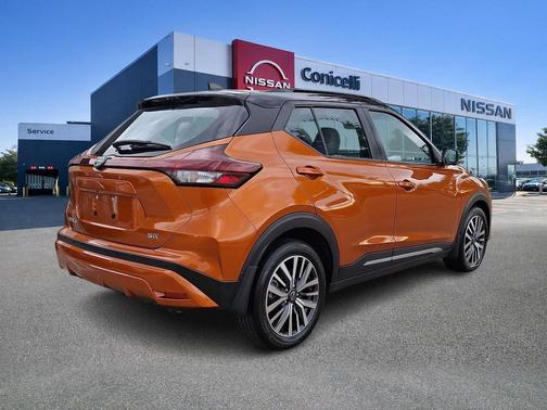 Monarch Orange Metallic/Super Black 2023 Nissan Kicks SR