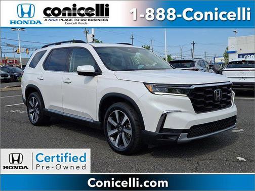 White 2023 Honda Pilot AWD Elite