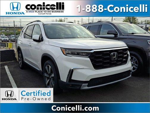White 2023 Honda Pilot AWD Elite