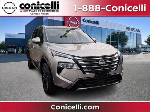 Champagne Silver Metallic/Super Black 2026 Nissan Rogue Platinum