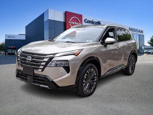 Champagne Silver Metallic/Super Black 2026 Nissan Rogue Platinum