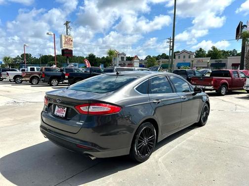 Ruby Red Metallic Tinted Clearcoat 2016 Ford Fusion SE