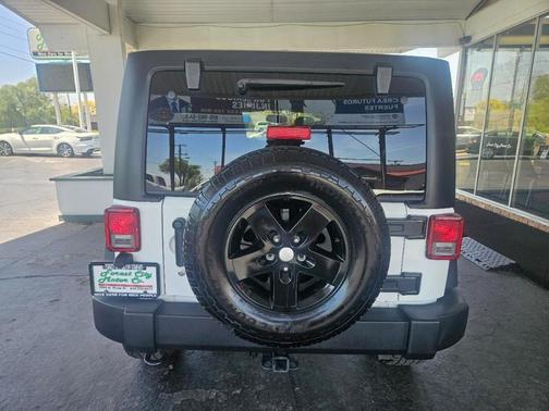 White 2015 Jeep Wrangler Unlimited Sport