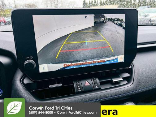 Wind Chill Pearl/Midnight Black Metallic 2023 Toyota RAV4 Hybrid SE
