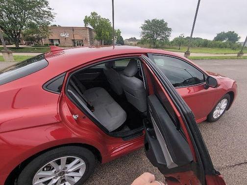 Supersonic Red 2025 Toyota Camry LE