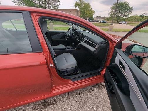 Supersonic Red 2026 Toyota Camry LE
