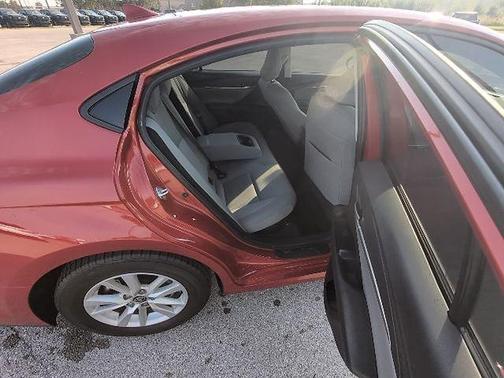 Supersonic Red 2025 Toyota Camry LE