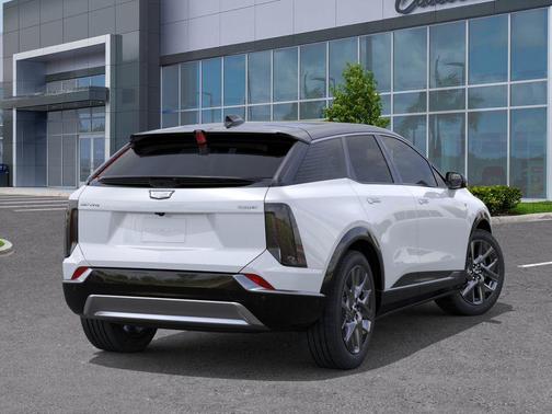 Vibrant White Tricoat 2026 Cadillac OPTIQ Luxury