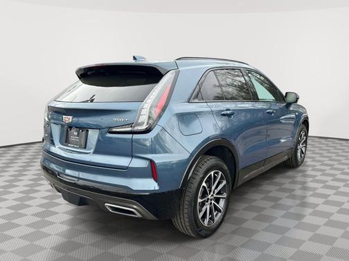 Deep Sea Metallic 2025 Cadillac XT4 AWD Sport