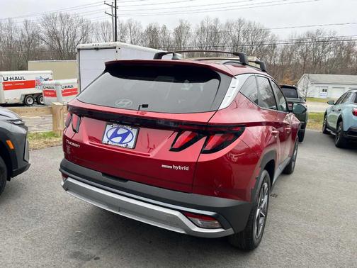 Red 2026 Hyundai TUCSON Hybrid SEL