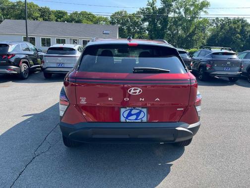 Red Metallic 2026 Hyundai KONA SEL Sport