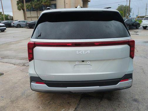 Ivory Silver 2025 Kia Carnival EX