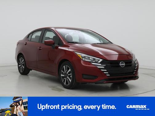 Red 2025 Nissan Versa SV
