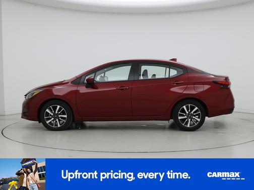 Red 2025 Nissan Versa SV
