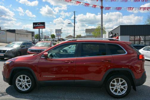 Burgundy 2017 Jeep Cherokee Sport