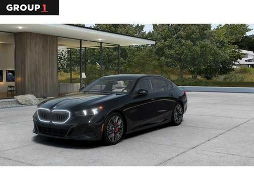 Black 2026 BMW 550e xDrive