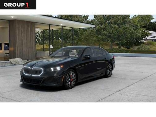 Black 2026 BMW 550e xDrive