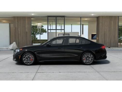 Black 2026 BMW 550e xDrive