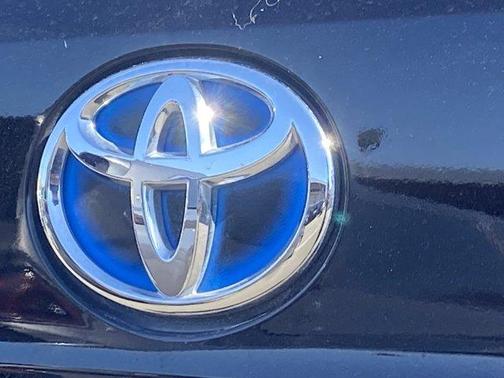 Opulent Amber 2021 Toyota Highlander Hybrid Platinum