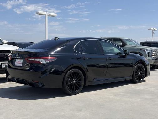 Midnight Black Metallic 2024 Toyota Camry Hybrid SE