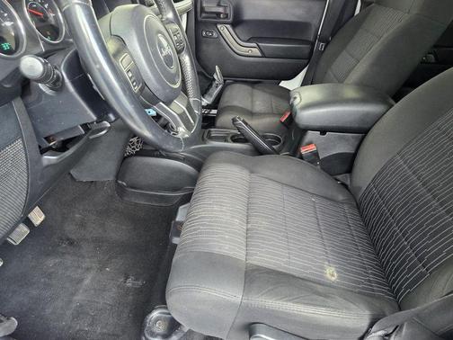 White 2012 Jeep Wrangler Unlimited Sport