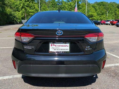 Midnight Black Metallic 2025 Toyota Corolla Hybrid SE