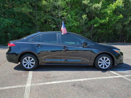 Midnight Black Metallic 2025 Toyota Corolla Hybrid SE