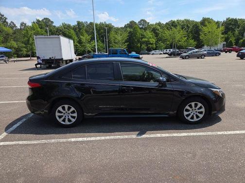 Midnight Black Metallic 2025 Toyota Corolla Hybrid SE