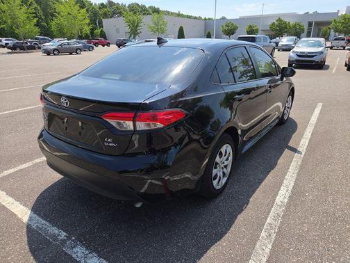 Midnight Black Metallic 2025 Toyota Corolla Hybrid SE