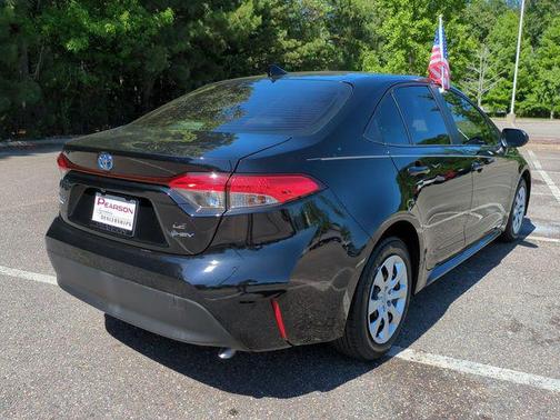 Midnight Black Metallic 2025 Toyota Corolla Hybrid SE