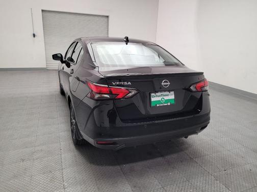 Super Black 2025 Nissan Versa 1.6 S