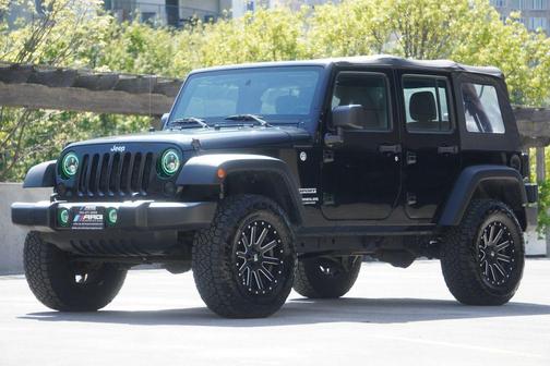 Black 2016 Jeep Wrangler Unlimited Sport