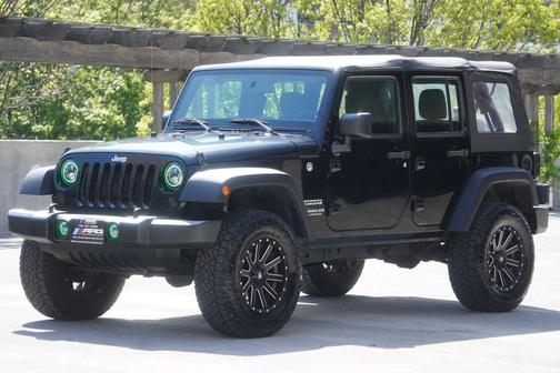 Black 2016 Jeep Wrangler Unlimited Sport